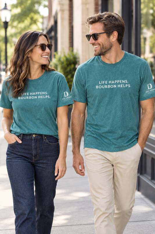 Woman and man wearing the teal tee in the city